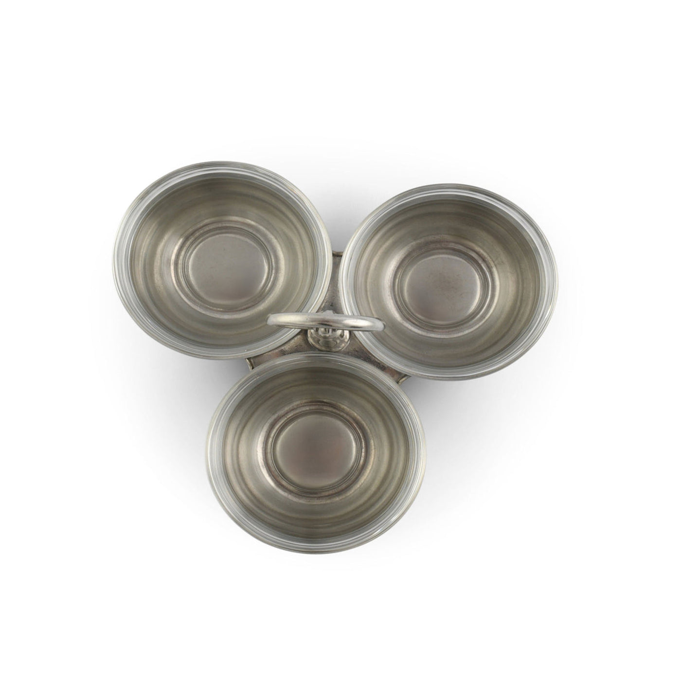 Set of three metallic bowls on a white background