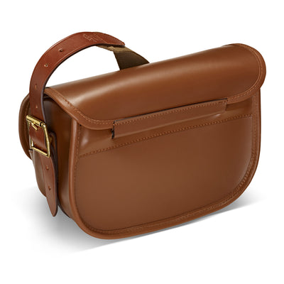Brown leather satchel bag on a white background
