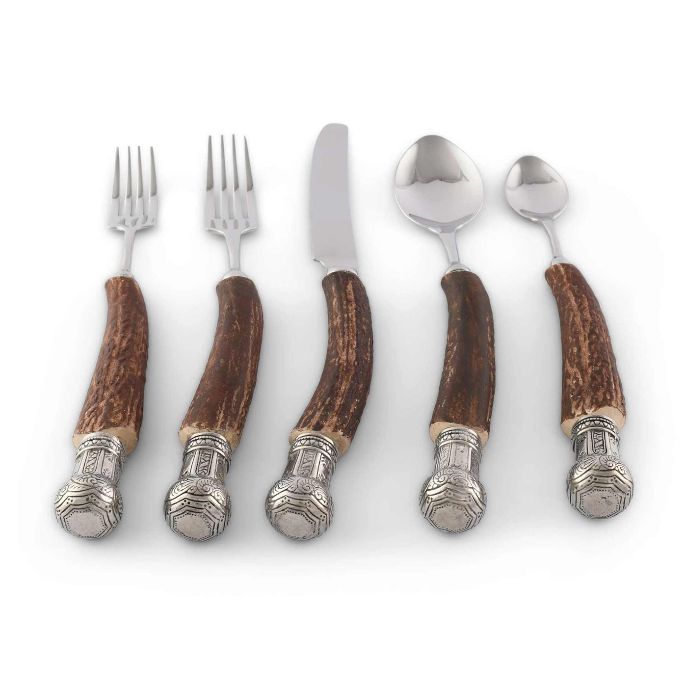 A set of flatware with handles that resemble antlers, including dinner knives, forks, spoons, a salad fork, and a teaspoon, all arranged side by side.