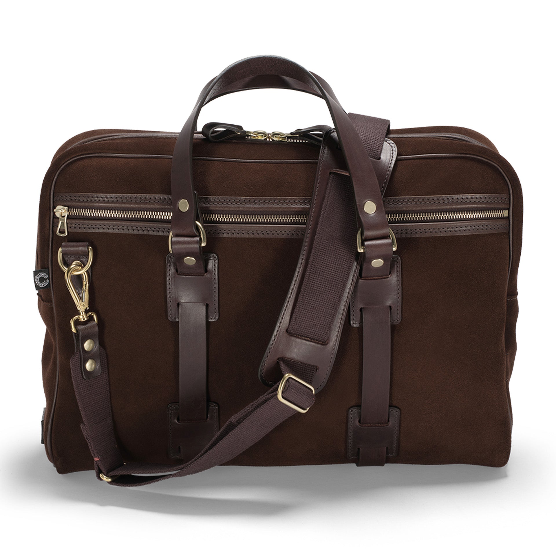 Brown leather briefcase with multiple zippers and straps on a white background