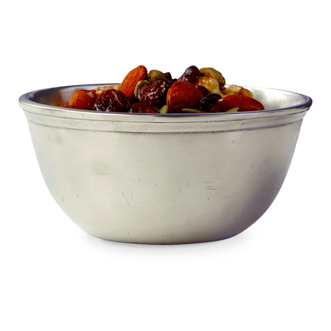 A silver all-pewter bowl filled with mixed nuts, including almonds and raisins, intended for serving as a table decoration.