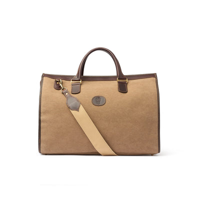 Brown handbag with a shoulder strap on a white background