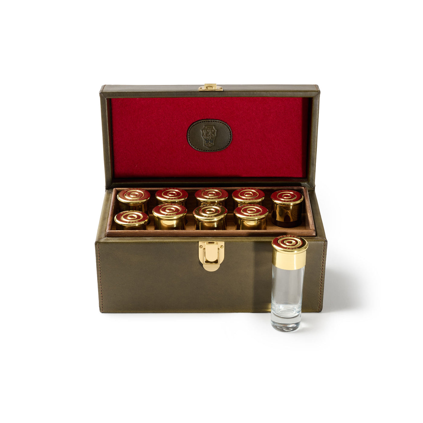 Set of gold and red bullet-shaped containers in a wooden box on a white background