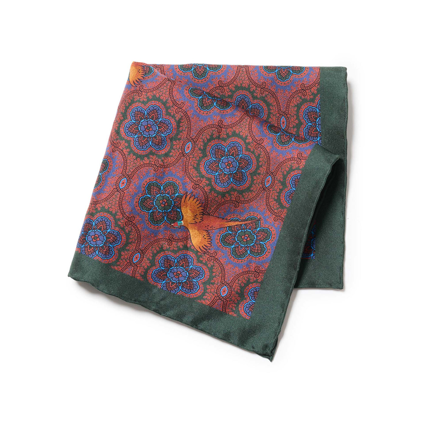 Folded fabric with floral and bird pattern on a white background