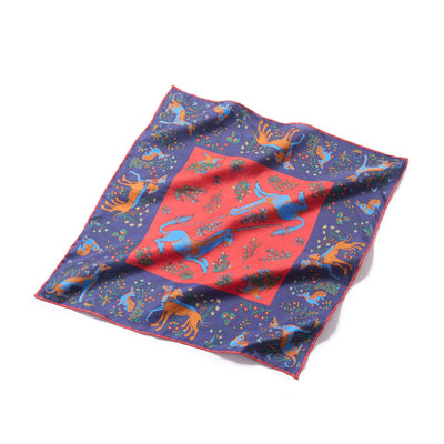 Colorful patterned fabric with animals on a white background