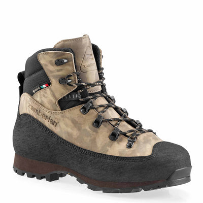 Brown hiking boot with black sole on a white background