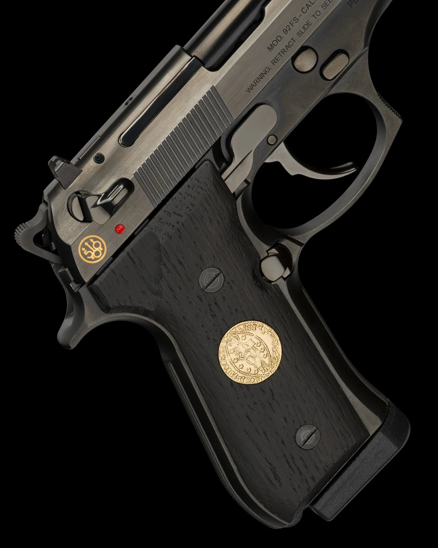 Close view of the dark Abonos oak grip, golden Venetian ducat insert, and 500 Years anniversary mark.